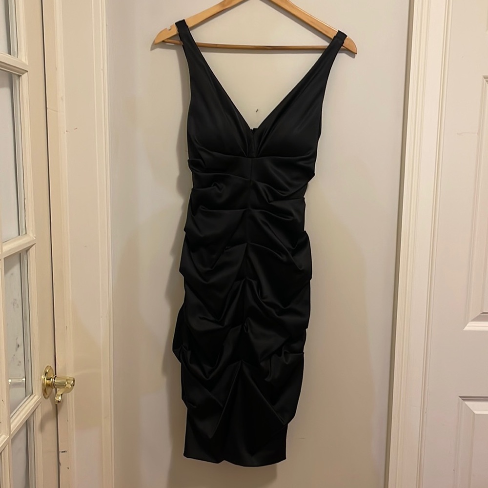 Black silk ruched cocktail dress. Perfect for formal events.MIDI length.